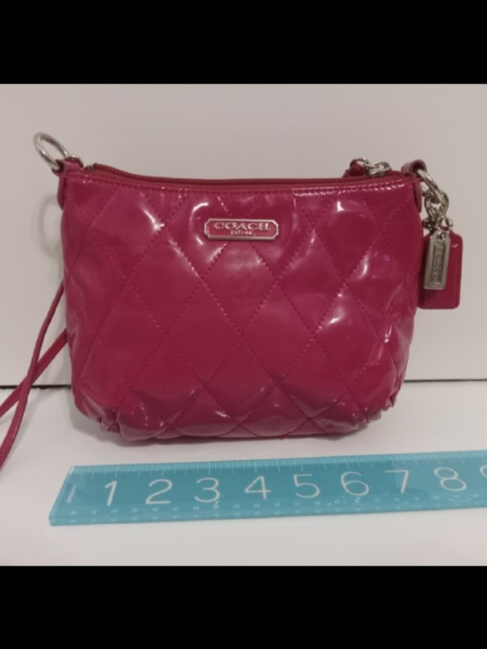 Coach Poppy pink quilted patent leather small crossbody bag